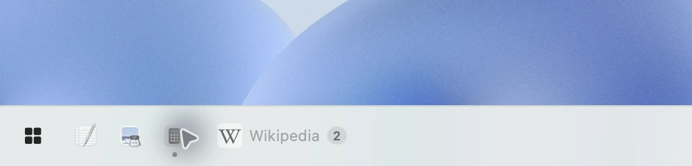 Two Wikipedia windows combined into one button with a count of 2
